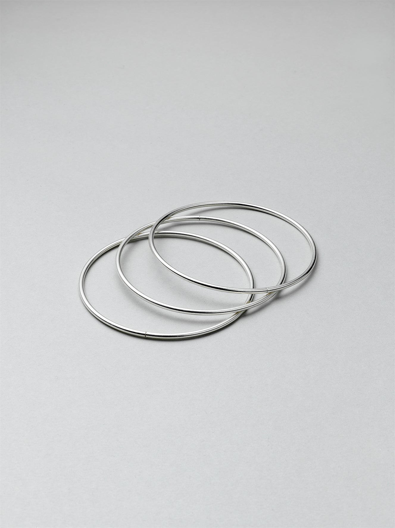 Thin silver stacking on sale bangles